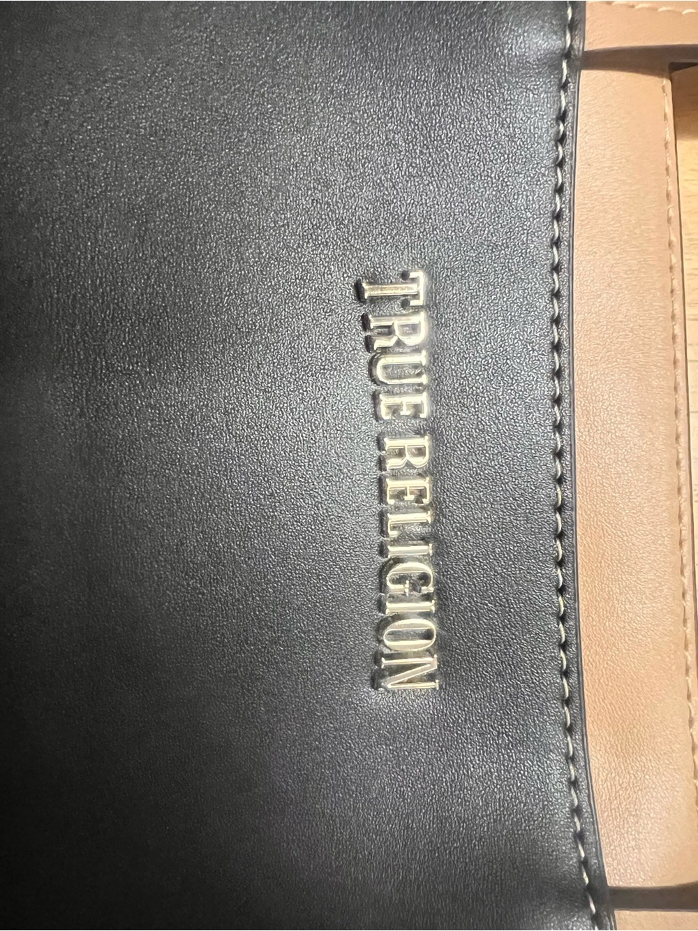 True Religion Woman’s Black and Tan Leather shoulder Bag